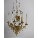 An attractive 19th Century French gilt bronze pierced and decorated six branch Ceiling Light,