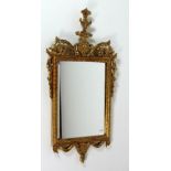 A 19th Century French style Mirror, with decorated cartouche and base with bevelled mirror, approx.