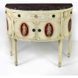 A 19th Century French demi-lune cream painted Commode,