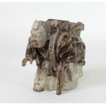 An antique Japanese porcelain Figure of an Old Man with chair on his back, and with circular stamp,