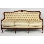 An attractive Louis XVI style French walnut Settee,