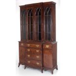 A Georgian style breakfront Bookcase, in the Gothic taste,