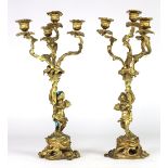 A pair of 19th Century gilt metal and ormolu four light Candelabra, with leaf moulded decoration,