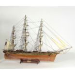 A large Scale Model of the Ship "Cutty-Sark," 1868 model in custom made display case, approx.
