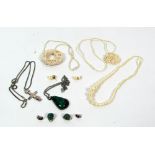 A collection of antique carved ivory jewellery, necklace chains, pendants, ear-rings,