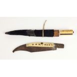 A 19th Century Middle Eastern spring action bone handled and decorated Pocket Knife,