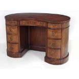 An attractive Edwardian kidney shaped Writing Desk,