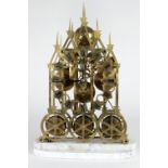 An attractive Edwardian brass Skeleton Cathedral Clock, with Roman numeral dial,