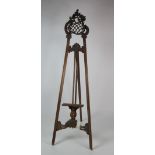 A tall 19th Century French walnut Easel,