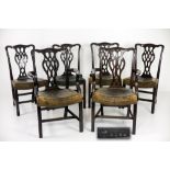 An attractive set of 14 (12 + 2) Chippendale style mahogany Dining Chairs, by F. Parker & Sons Ltd.