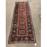 A very attractive and fine quality large Oriental Runner, with multiple borders,