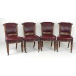 A set of four Irish oak Side Chairs, the shaped back with carved ears,
