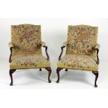 A pair of late 18th Century / early 19th Century large French style Gainsborough mahogany Armchairs,