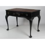 A Chippendale style bow fronted Writing Table, with leather inset top,