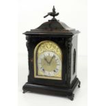 A Victorian brass dial and mounted ebonised Bracket Clock,