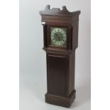 An unusual Georgian style mahogany miniature Grandfather Clock,