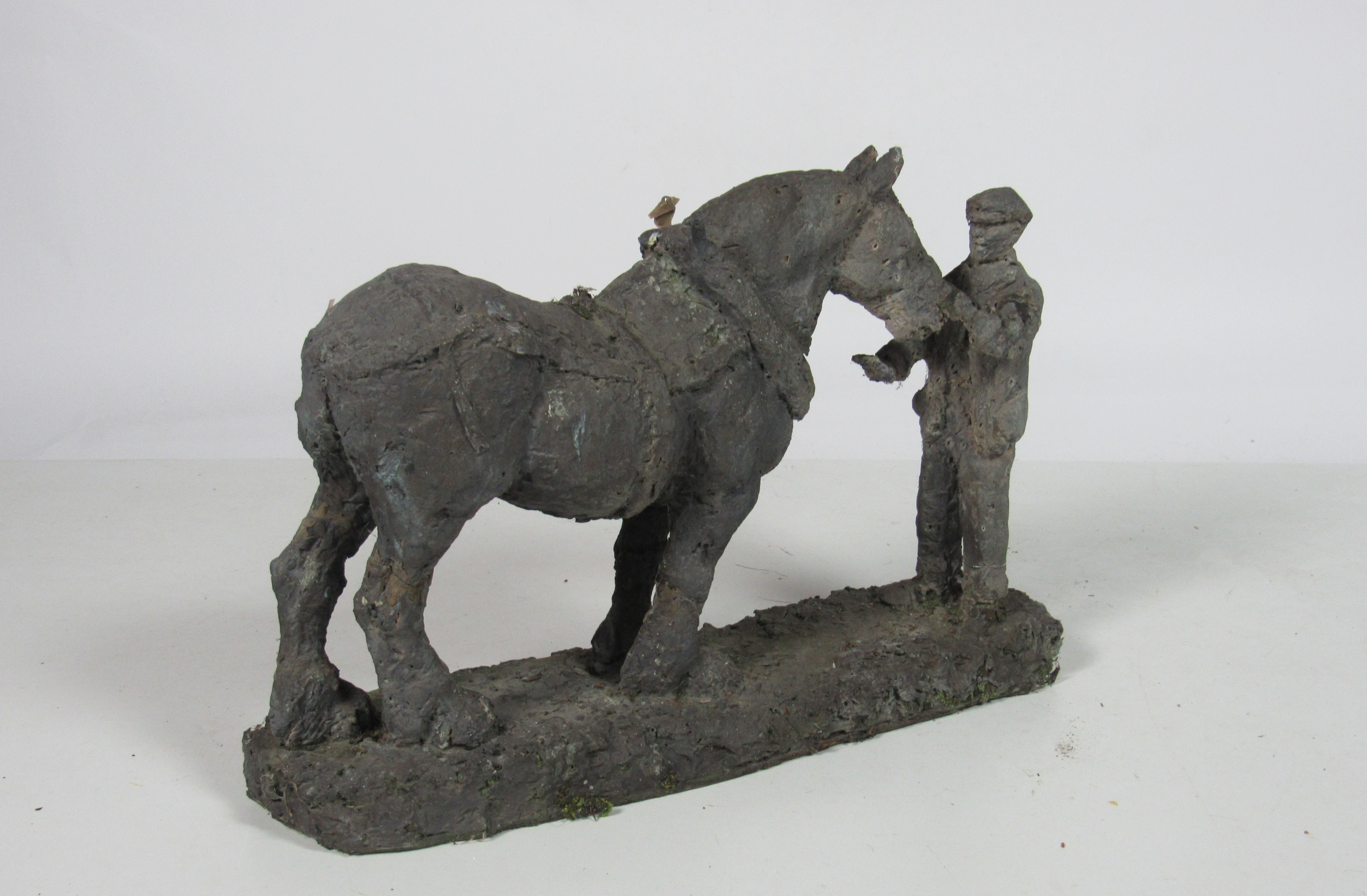20th Century Irish School An original plaster maquette of a ploughman and horseman.