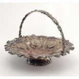A very ornate English silver Fruit Basket, with swing handle, and engraved and embossed decoration,