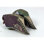 A small pair of 19th Century Chinese Ladies small silk Shoes, with embroidered decoration.