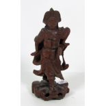 A fine carved Oriental hardwood Figure of a Mulan Warrior, approx. 37cms (14 1/2") high.