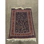 An antique Oriental Rug or Wall Hanging, with multiple borders,
