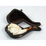 A good quality 19th Century carved Meerschaum Pipe, cased.