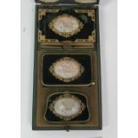 An attractive Victorian cased set of Missal, Diary and Purse, each with gilt bronze mounts,