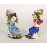 A pair of 19th Century French porcelain figural Vases, in the style of Jacob Petit (Paris),