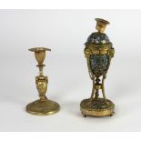 A 19th Century Adams style gilt bronze and champleve urn shaped Candlestick,