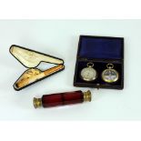 A cased pair Barometer & Compass; a crimson cutglass double ended Scent Bottle;