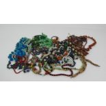 Jewellery: A large box of colourful Costume Jewellery, over 30 bead necklaces,