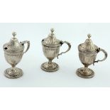 A set of three Georgian period urn shaped Mustard or Condiment Pots,