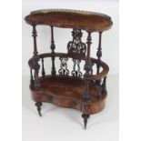 A Victorian walnut kidney shaped Music Cabinet,