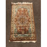 A good quality and attractive orange ground Oriental silk Rug or Wall Hanging,