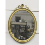 A large Victorian upright oval Mirror, with decorated shell cartouche, approx. 100cms (39").