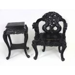 A 19th Century carved and ebonised Chinese hardwood dragon Armchair,