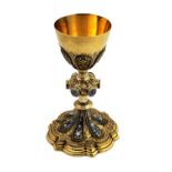 An attractive mid-19th Century French hallmarked silver and gilded Chalice, with finely embossed,