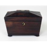 A small early Victorian rosewood casket shaped Tea Caddy,