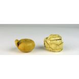 A small Japanese ivory Carving of a fruit; and a leafed Vegetable with a locust,