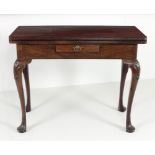 A 19th Century Irish mahogany fold-over gate-leg Tea Table, the plain top with reeded edges,