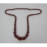 An attractive 19th Century amber bead Necklace, approx. 86cms (34") long.