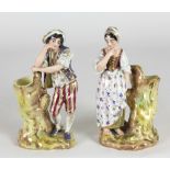 An good pair of 19th Century painted French porcelain figural Vases,