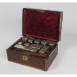 A Regency walnut brass inlaid and brass mounted Gentleman's Vanity Case,