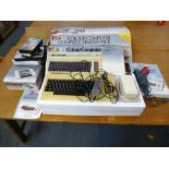 COMMODORE VIC 20 WITH BOX, 1530 DATASSETTE UNIT, INTRODUCTION TO BASIC, DEFENDER 64 GUN AND A