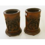 PAIR OF CARVED ORIENTAL BAMBOO BRUSH POTS ON STANDS