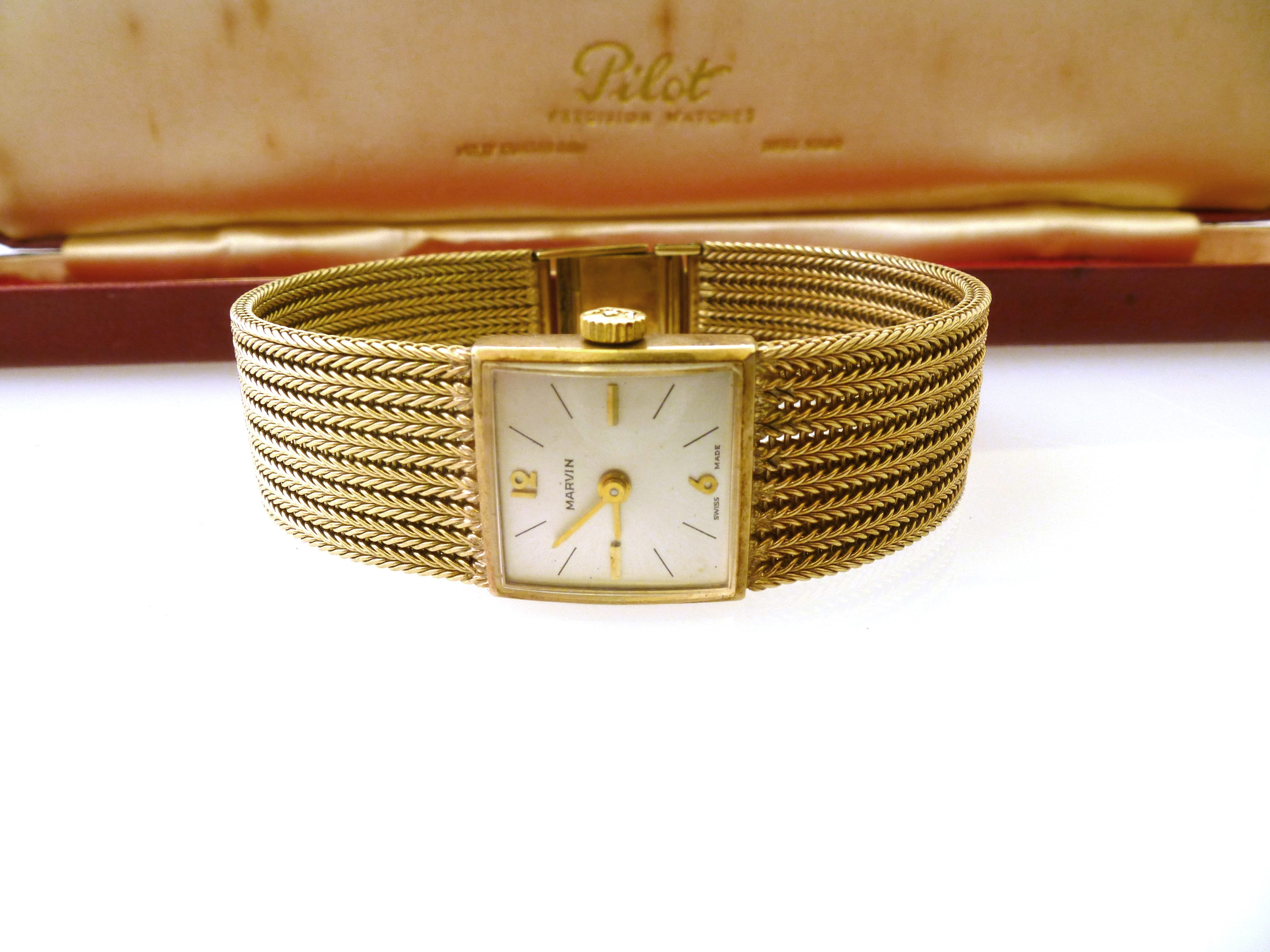 9K YELLOW GOLD MARVIN WATCH WITH A MESH BRACELET. TOTAL WEIGHT 31G