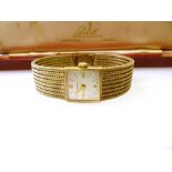 9K YELLOW GOLD MARVIN WATCH WITH A MESH BRACELET. TOTAL WEIGHT 31G