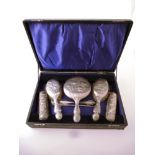 SILVER VICTORIAN DRESSING TABLE SET IN CASE. SMALL BRUSHES HAVE LOOSE BACKS
