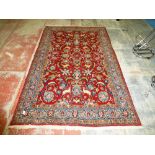 RED AND BLUE PATTERNED RUG
