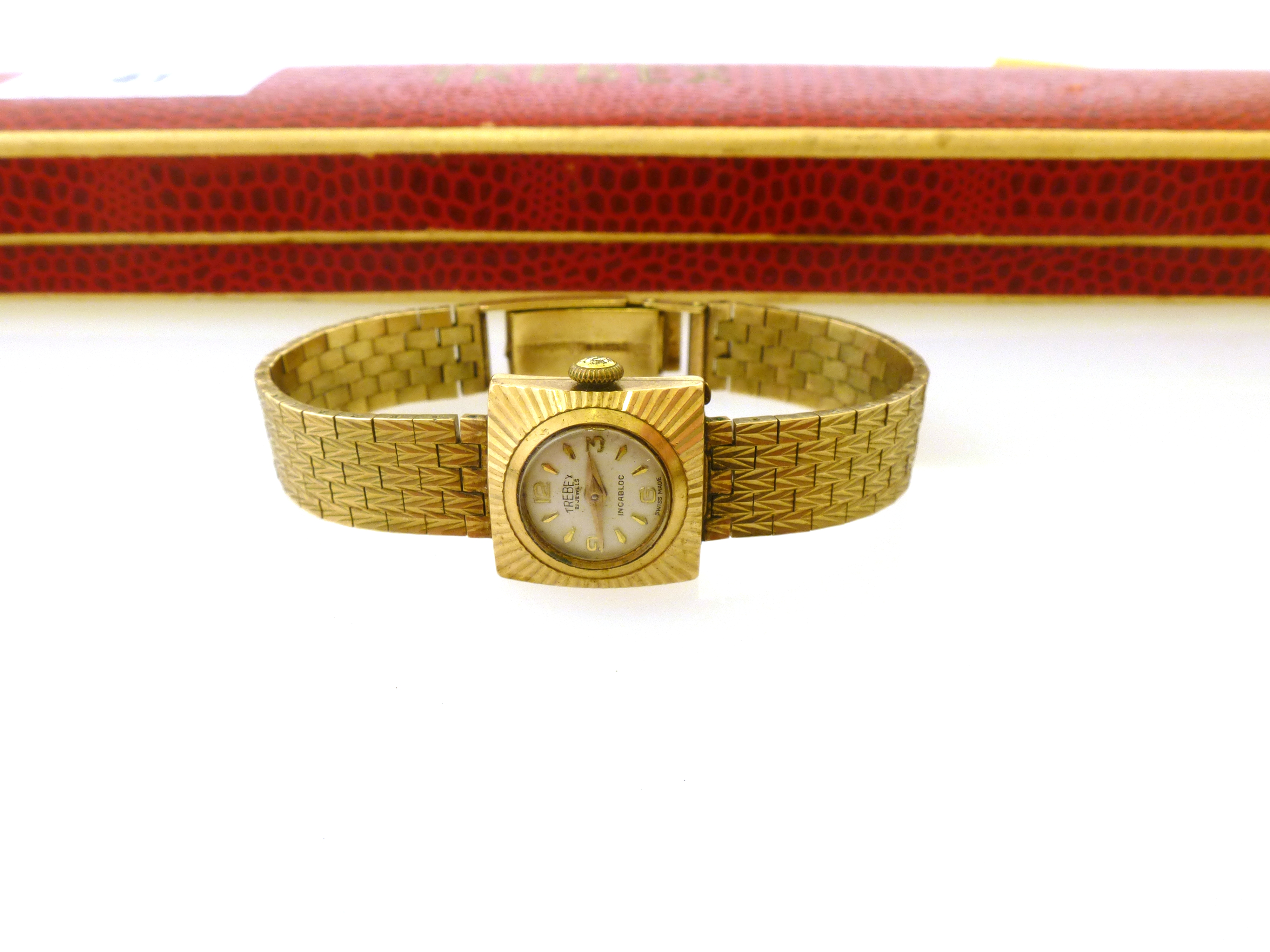 9K YELLOW GOLD TREBEX WATCH WITH A DIAMOND CUT BRACELET. WEIGHT IN TOTAL 23.7G